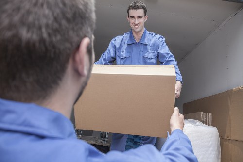 Removal van and moving boxes representing transparent Glasgow removals pricing