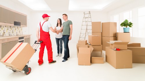 Professional movers handling furniture during a Glasgow relocation