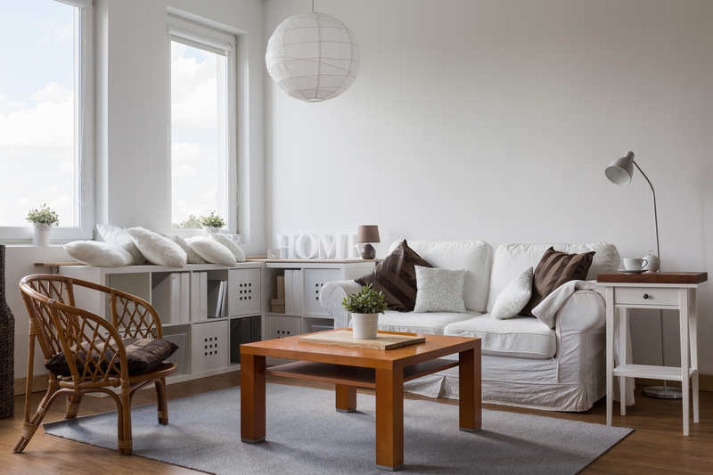 Professional movers handling furniture in a Glasgow tenement